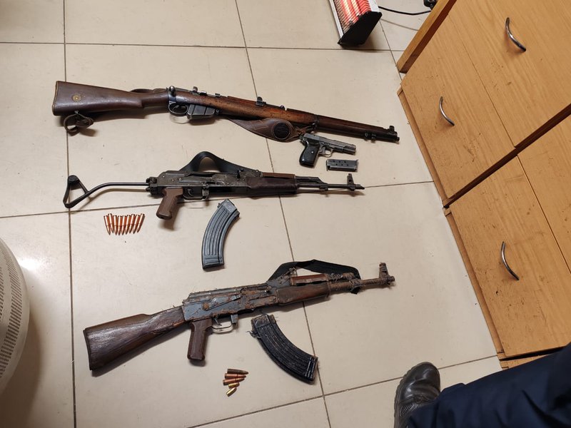 Suspects arrested for possession of firearms