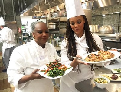 Tyra Banks taking cooking lessons