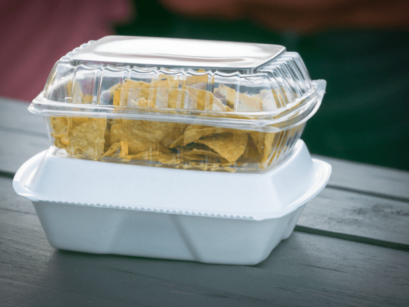 Leftover takeout food in disposable boxes