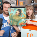 Taylor Swift and Travis Kelce with her new album cover