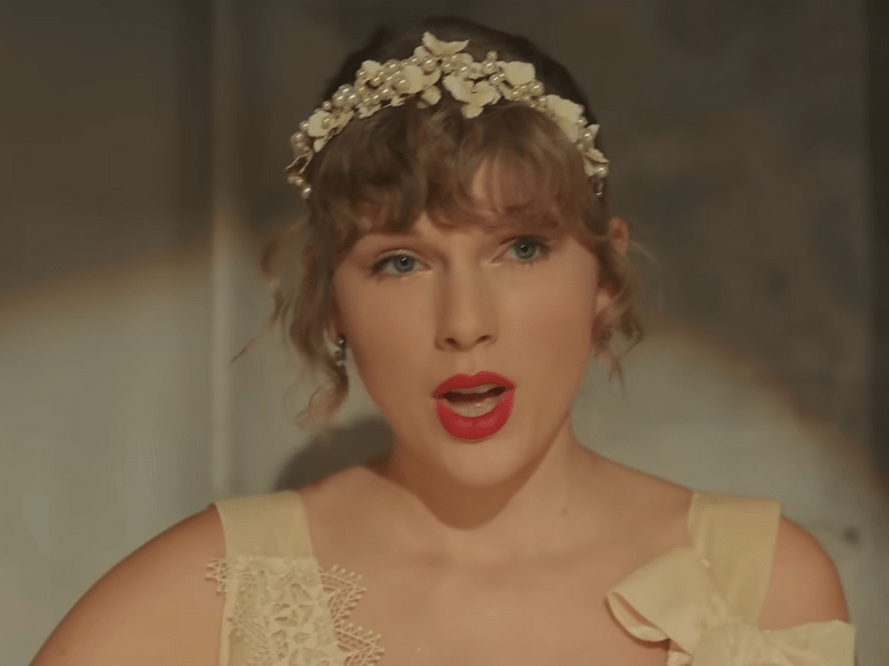Taylor Swift wearing a floral headband with beads