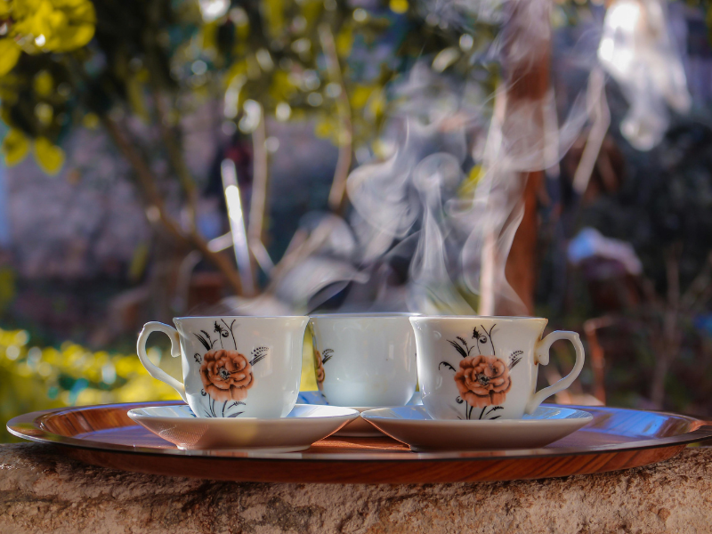 Teacups and saucers on a tray