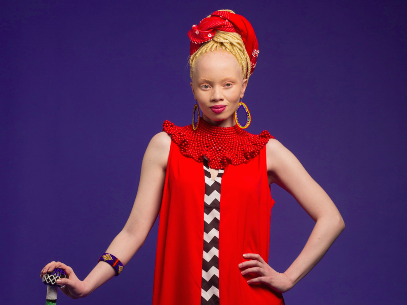 Thando Hopa poses with African attire