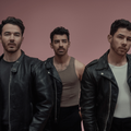 The Jonas Brothers wearing cool and edgy coordinated outfits