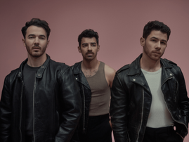 The Jonas Brothers wearing cool and edgy coordinated outfits