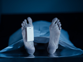 The feet of a dead body at a morgue or hospital
