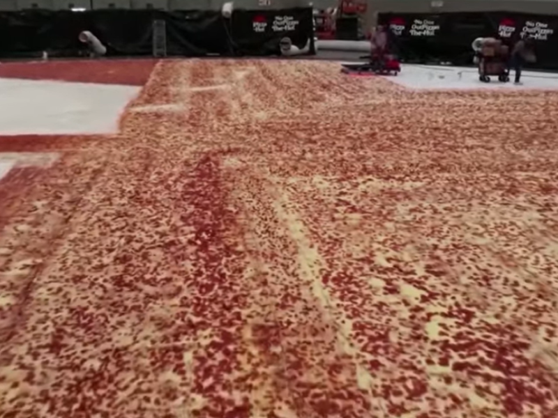 The world's largest pizza being constructed