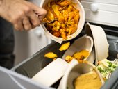 Throwing Away Leftover Food In Trash