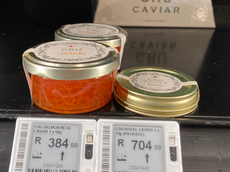 Tins of caviar on a shelf