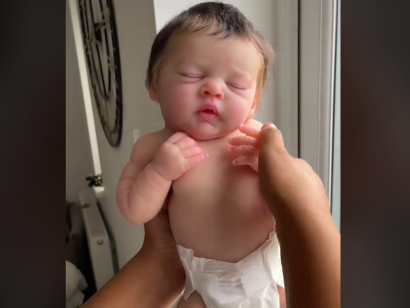 Toy baby doll that looks like real baby