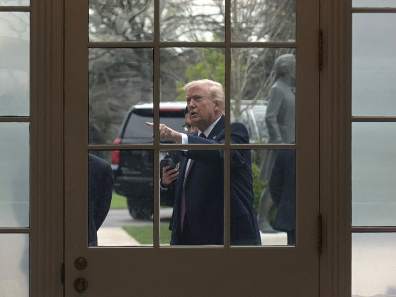 US President Donald Trump from the White House window
