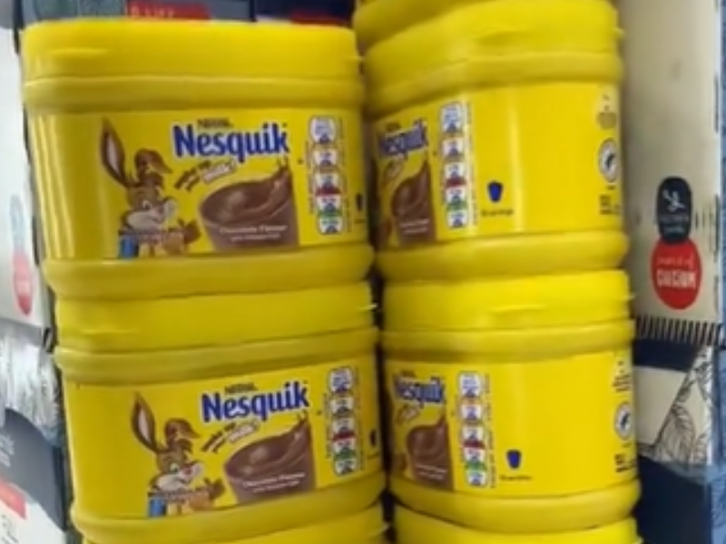 Tubs of Nesquik milkshake packed on a store shelf
