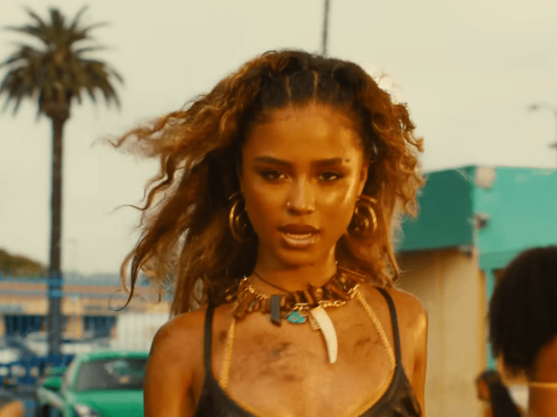Tyla with wavy golden brown hair