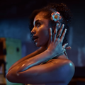 Tyla wearing a flower in her hair
