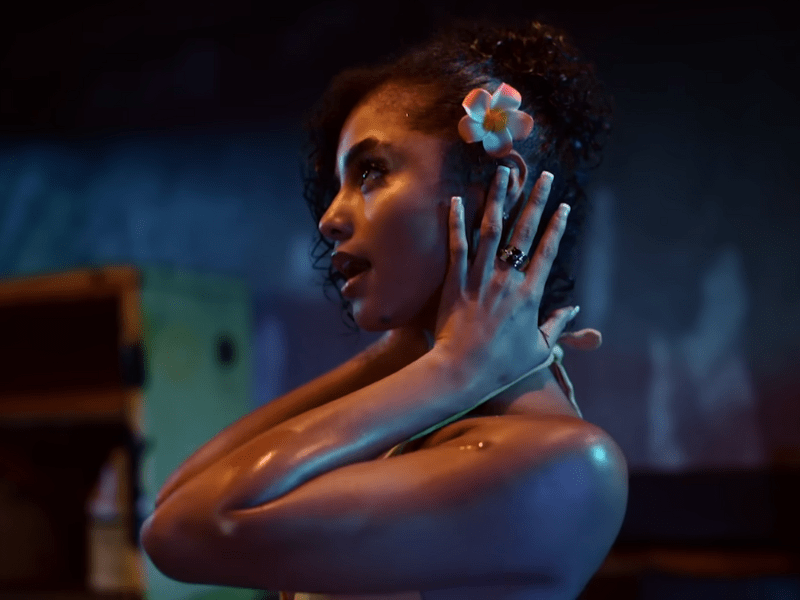 Tyla wearing a flower in her hair