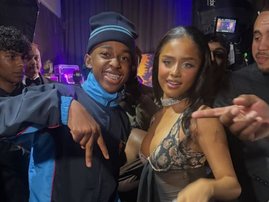 Tyla standing alongside Lulutho Sinxoto (Peanuts)