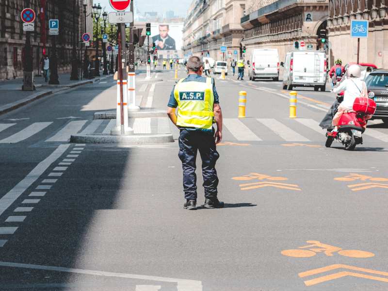 Unrecognisable traffic police officer on road