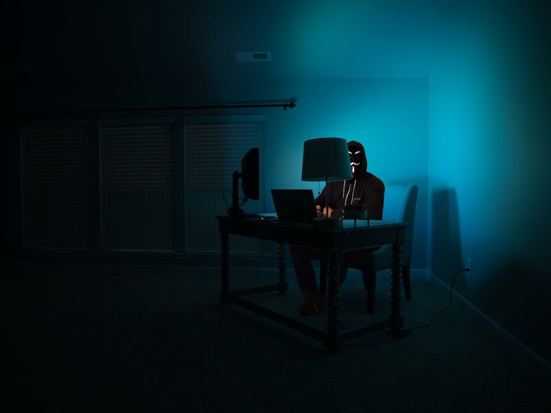 Man computer dark