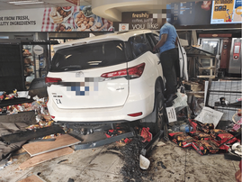 VEHICLE CRASHES INTO Glenfair BP is in PTA east