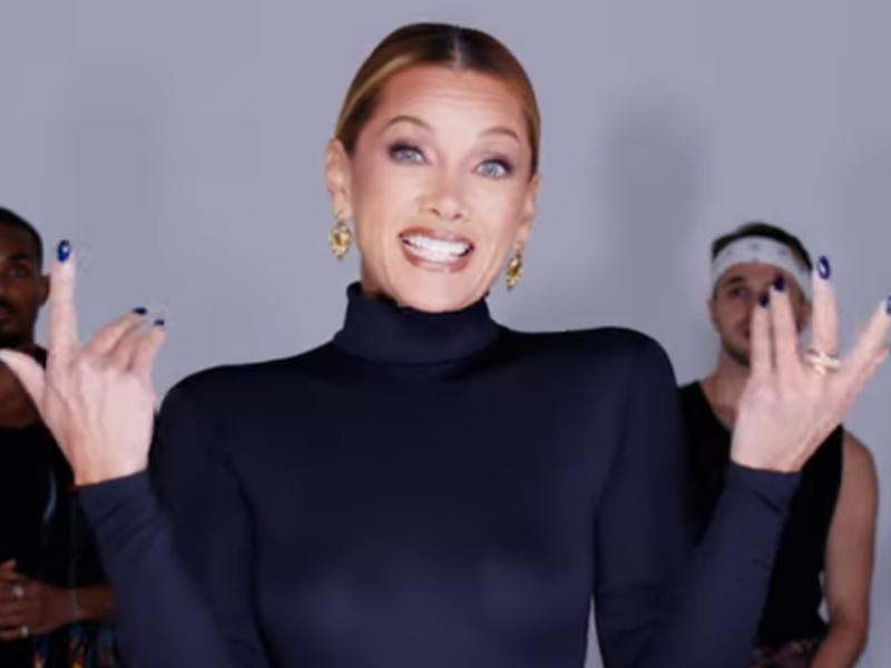 Vanessa Williams wearing a black polo neck