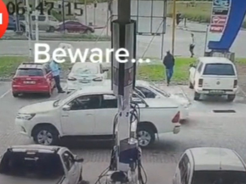 Vehicles parked at a petrol station