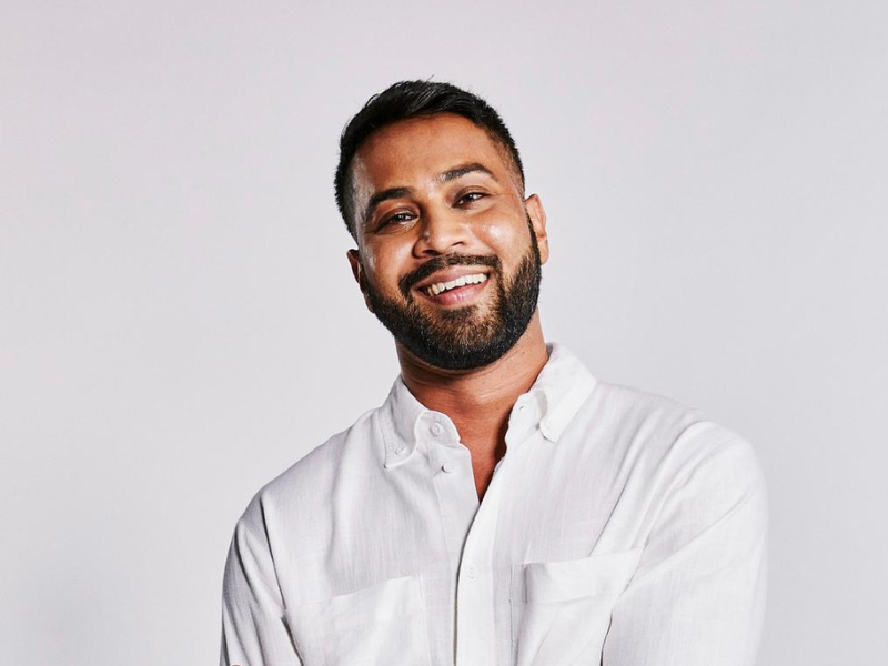 Vic Naidoo posing for a portrait