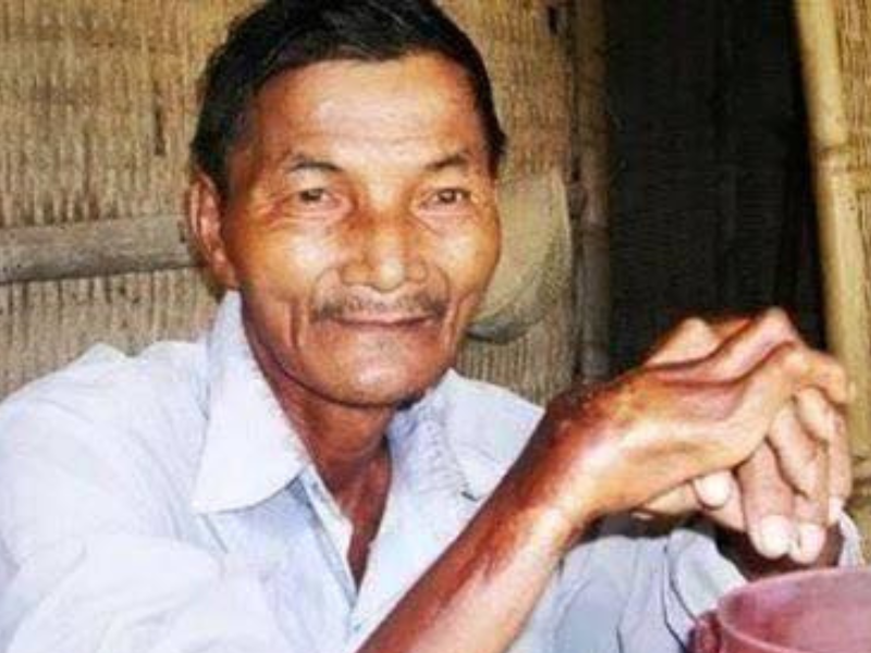 Vietnamese man with hands crossed