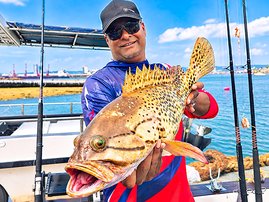 Vinesh Soogreem with a catface rockcod caught deep off the Bluff