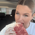 WOMAN EATS RAW MEAT IN CAR