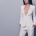 WOMAN WEARING REVEALING WHITE SUIT