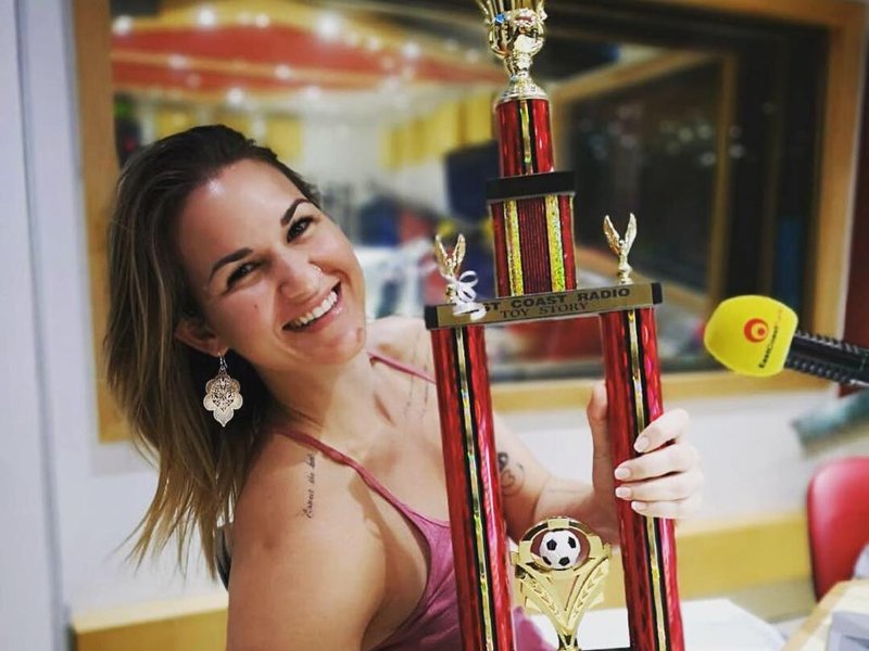 keri miller with trophy