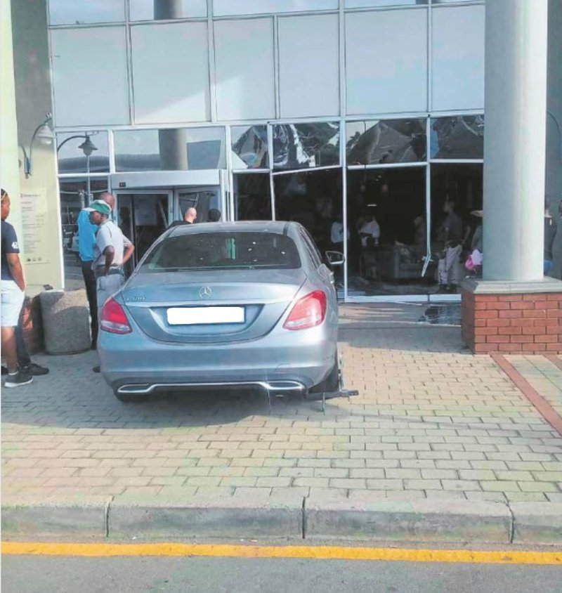 WATCH: Standard Bank customer ploughs her car through the building after teller failed to help her