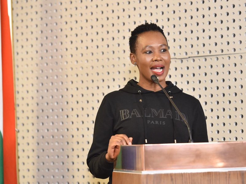 Stella Ndabei-Abrahams in a hoodie at briefing cellphone data