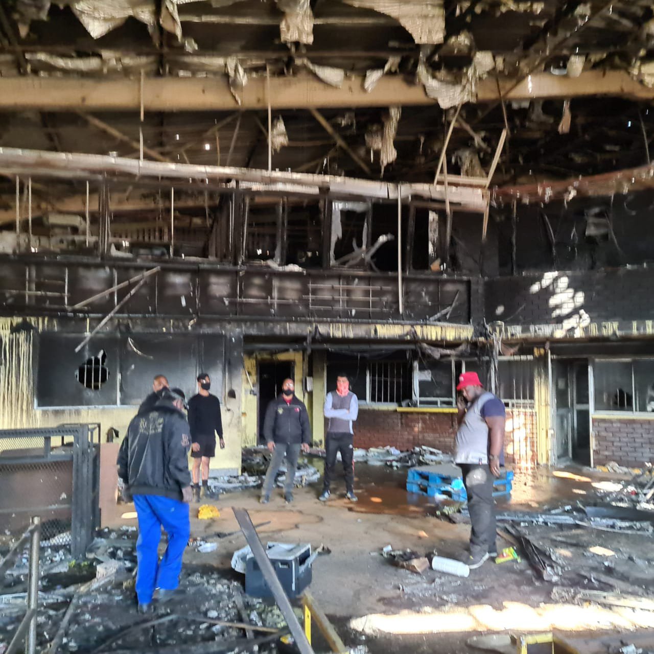 "My childhood. My grandparents shop. Looted and on fire as of this morning. I feel numb."