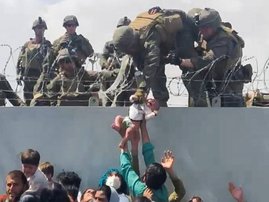 Afghan baby lost in US airlift chaos reunited with family