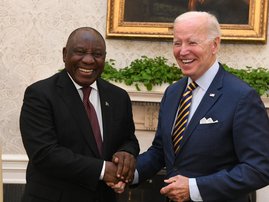 President Joe Biden shakes hands with South African President Cyril Ramaphosa