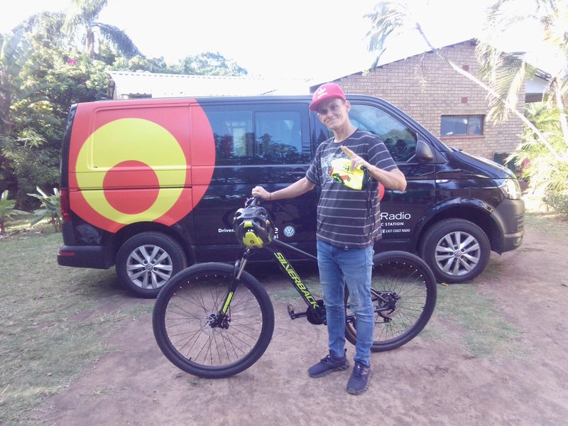 Keegan receiving his Bike thanks to those who played an important role.