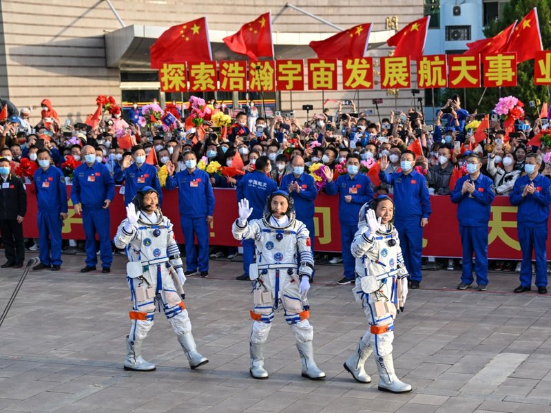 Chinese mission with first civilian reaches space station