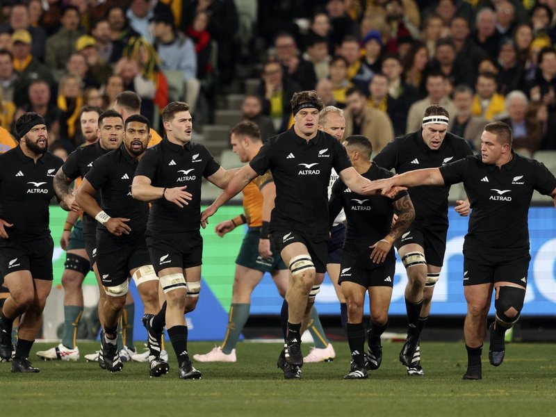 All Blacks Scott Barrett (C) celebrates scoring a try