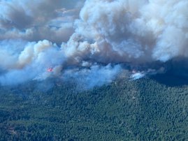 Wildfires threaten western Canada city as far north evacuated