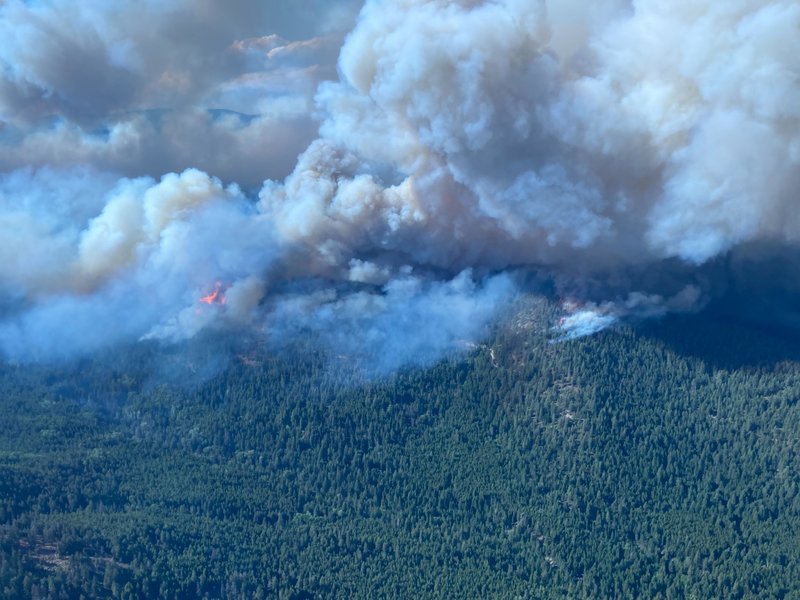 Wildfires threaten western Canada city as far north evacuated