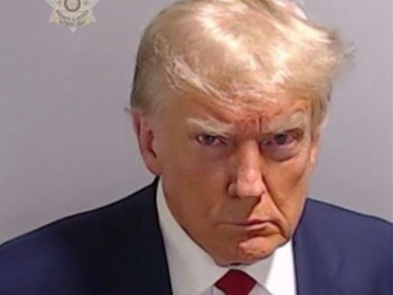 Trump arrested in election case, mug shot released