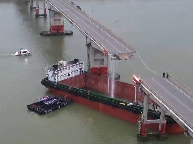 Two dead after cargo ship hits bridge in southern China
