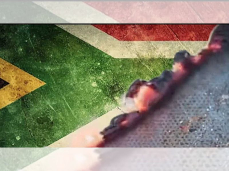 BURNING SOUTH AFRICAN FLAG