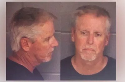Father charged along with son, 14, in US school shooting