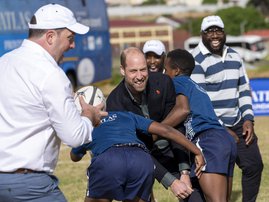 Prince William playing rugby
