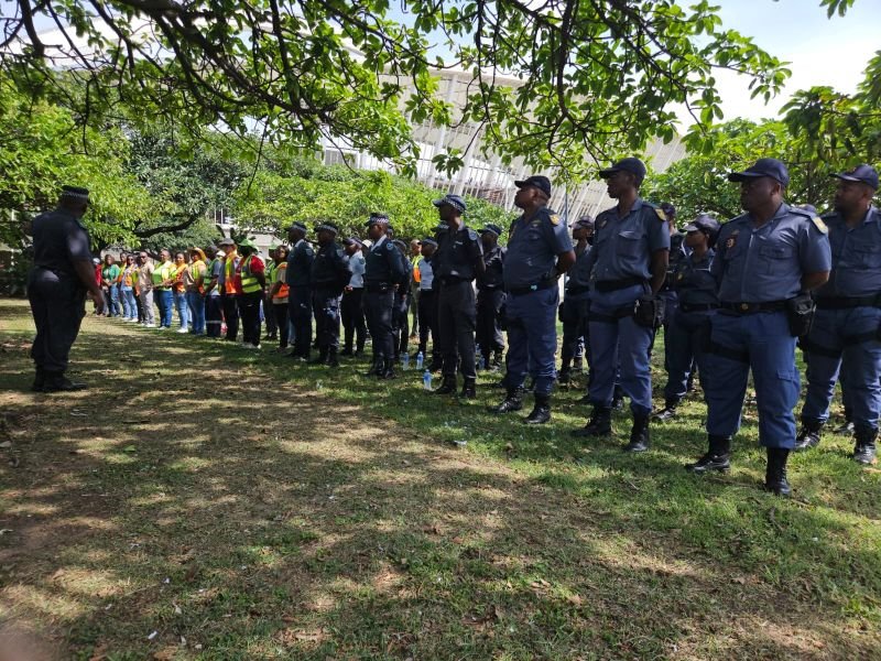Police and other units on the raid