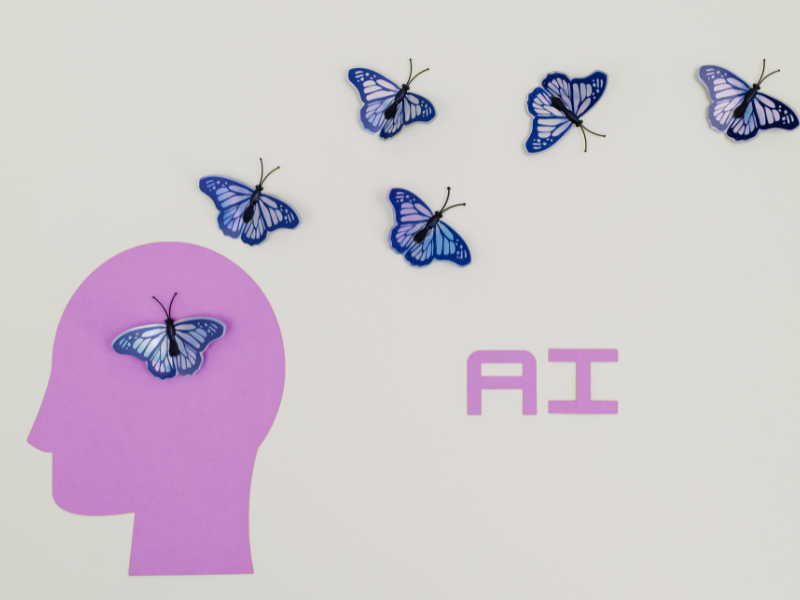 White and blue butterflies on head to represent AI tech