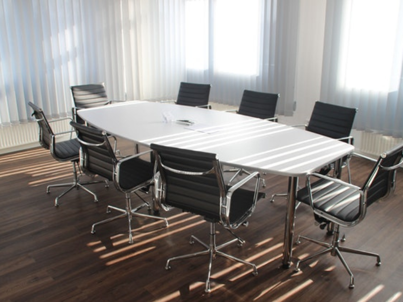 White wooden table with chairs