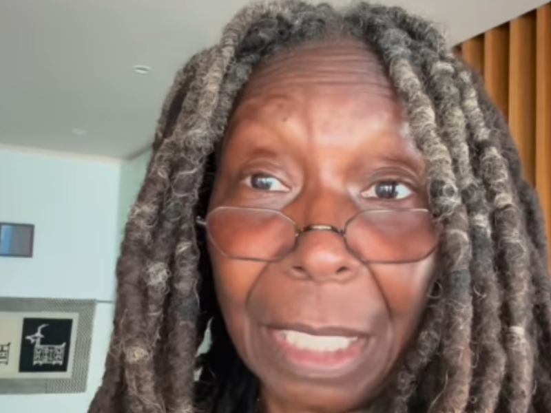Whoopi Goldberg with her dreadlocks and spectacles